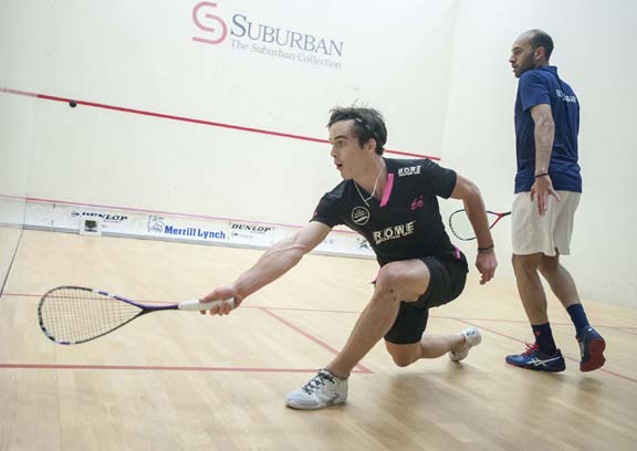 Paul Coll retrieves another deep drive from Marwan ElShorbagy in their grueling five-game final. (Photo by Bryan Mitchell for MCO)