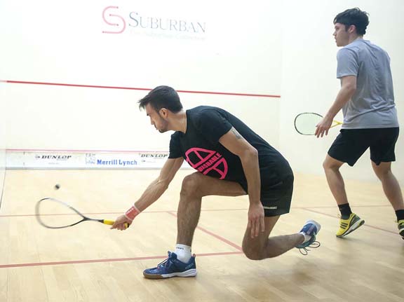 BIRMINGHAM, MICHIGAN, USA - JANUARY 29: Iker Pajares Bernabeu (Spain), left, and Chris Simpson (England) compete in a qualifying round during the 2019 Motor City Open (MCO) squash tournament, presented by The Suburban Collection, Tuesday, January 29, 2019 at the Birmingham Athletic Club in Birmingham, Michigan. Pajares Bernabeu won the match. (Photo by Bryan Mitchell for BAC)
