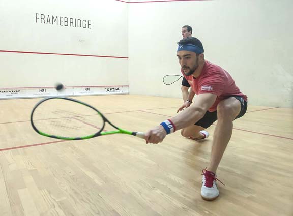BIRMINGHAM, MICHIGAN, USA - JANUARY 29: Chris Hanson (USA), front, and Cambell Grayson (New Zealand) compete in a qualifying round during the 2019 Motor City Open (MCO) squash tournament, presented by The Suburban Collection, Tuesday, January 29, 2019 at the Birmingham Athletic Club in Birmingham, Michigan. (Photo by Bryan Mitchell for BAC)