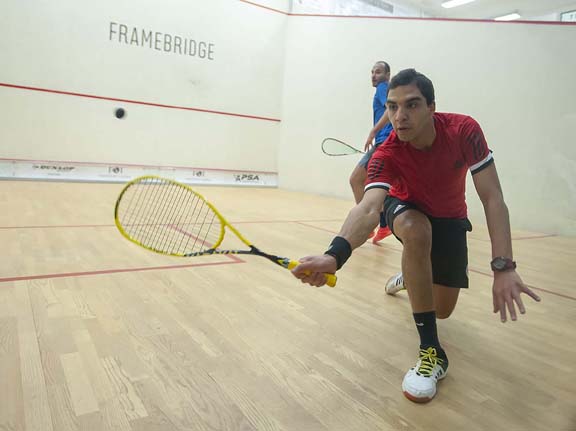 BIRMINGHAM, MICHIGAN, USA - JANUARY 29: Zahed Salem (Egypt), front, and Mohamed Reda (Egypt) compete in a qualifying round during the 2019 Motor City Open (MCO) squash tournament, presented by The Suburban Collection, Tuesday, January 29, 2019 at the Birmingham Athletic Club in Birmingham, Michigan. Salem won the match. (Photo by Bryan Mitchell for BAC)